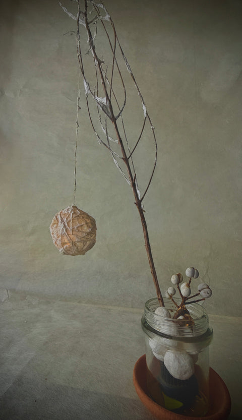 Cocoon Lantern Paper Pulp Decoration Workshop uses dried branches and a soft LED light inside a handmade paper form. Version 2