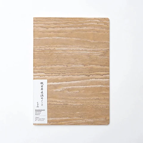 Woodgrain Notebooks by Awagami Factory feature a vintage wood grain pattern transferred onto washi, part of our Japanese notebooks range. Version 1